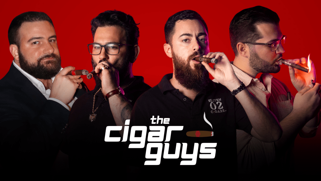 The Cigar Guys hosts Alex, Mark, Zach and Jared at the podcast table
